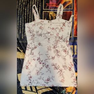 SOLD - NWT - No Boundaries white floral pinafore dress with pockets.